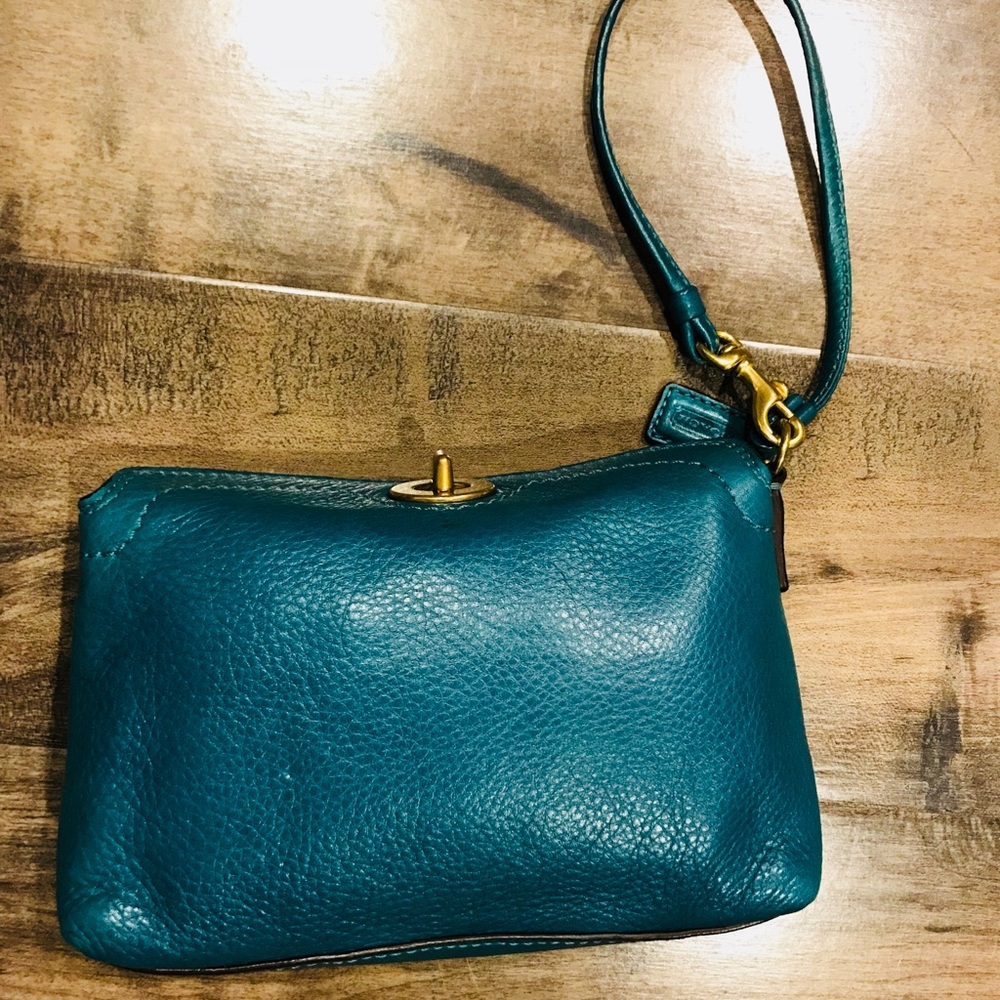 Peacock blue coach wristlet